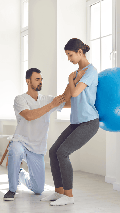 Physio helping patient Physio helping patient