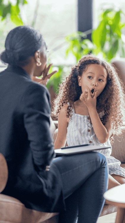 Speech therapist and child